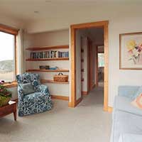 Guest house upstairs front bedroom, has a sleep .  Shares a